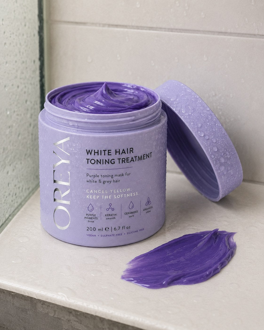 Open Oreya White Hair Toning Treatment showing its purple texture