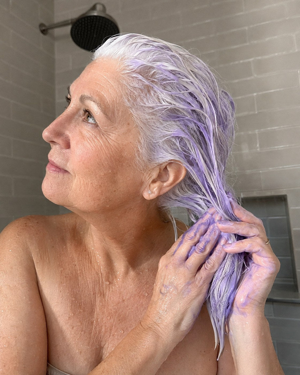 Oreya purple toning treatment applied through wet white hair